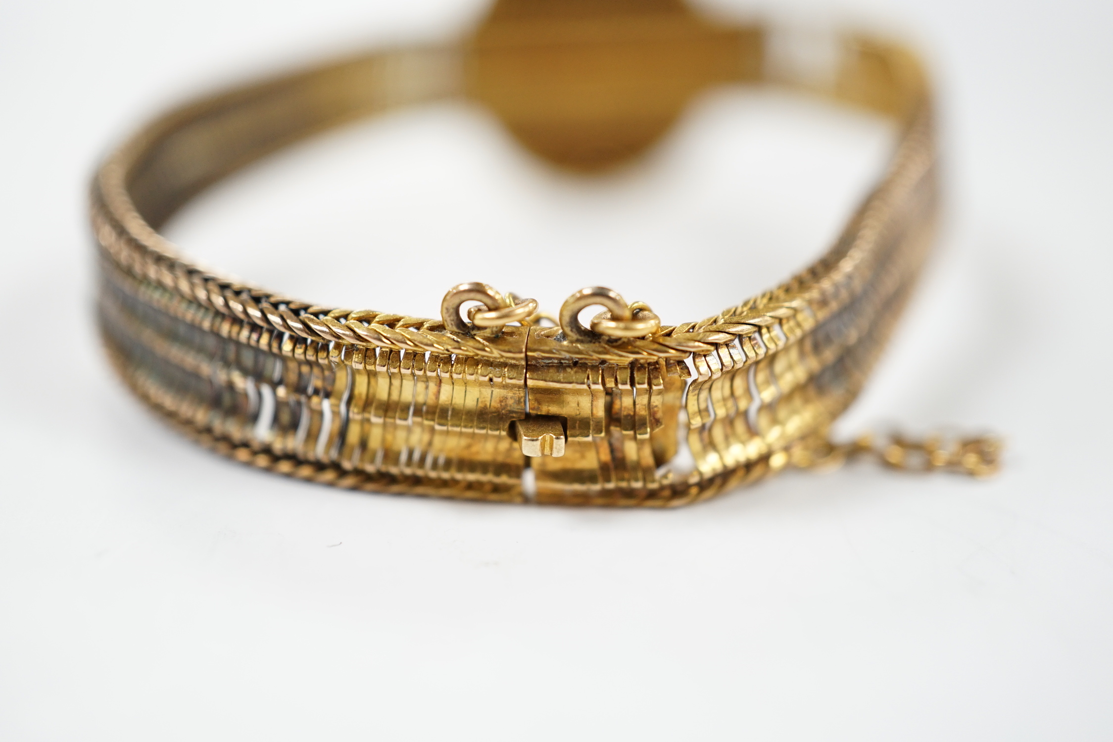 A Victorian yellow metal and cannetile work bracelet, (a.f.), 11 grams.